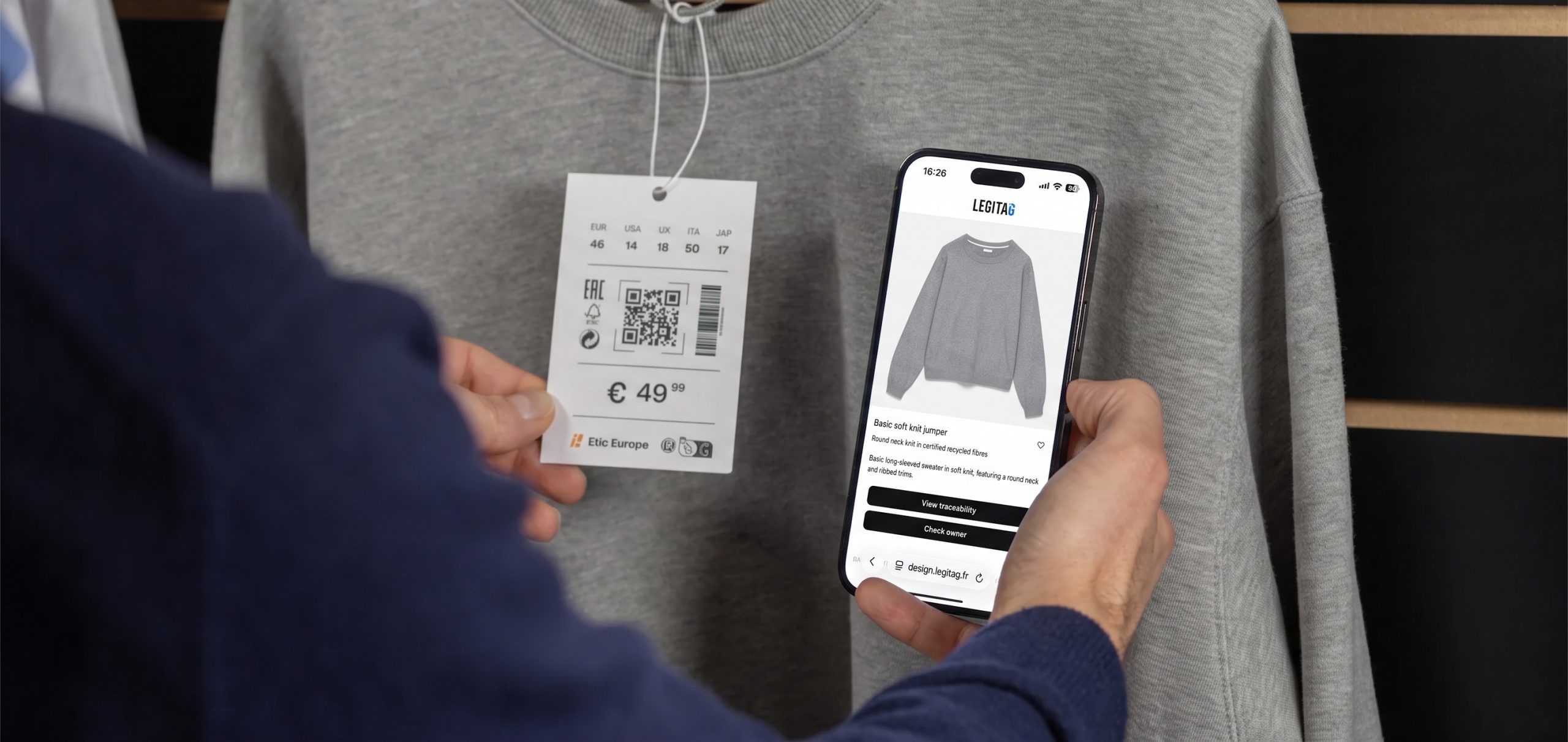 Hand scanning a label to open a digital product passport for textile on a smartphone